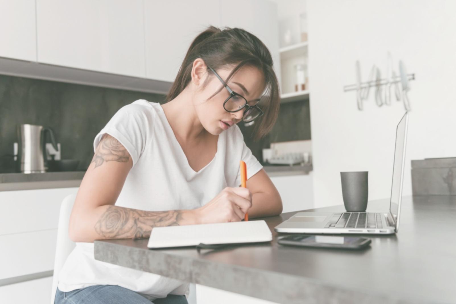 Team meeting discussing client financial strategies around conference table